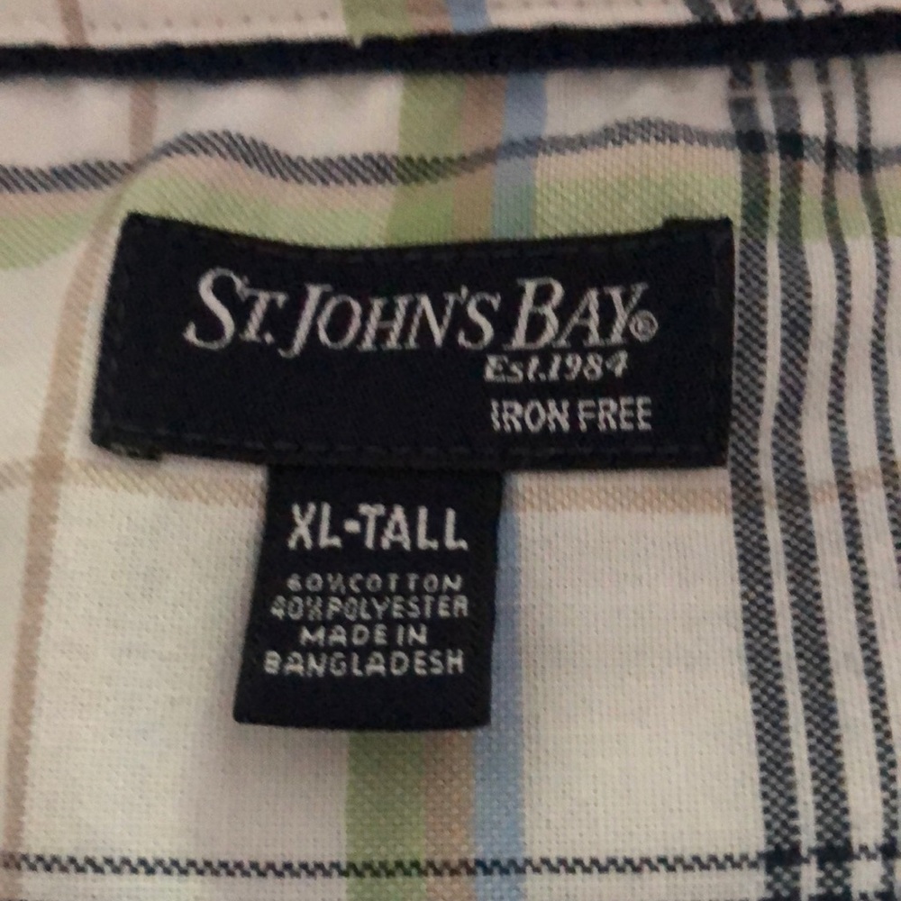 Plaid green, blue, tan and white casual shirt.
